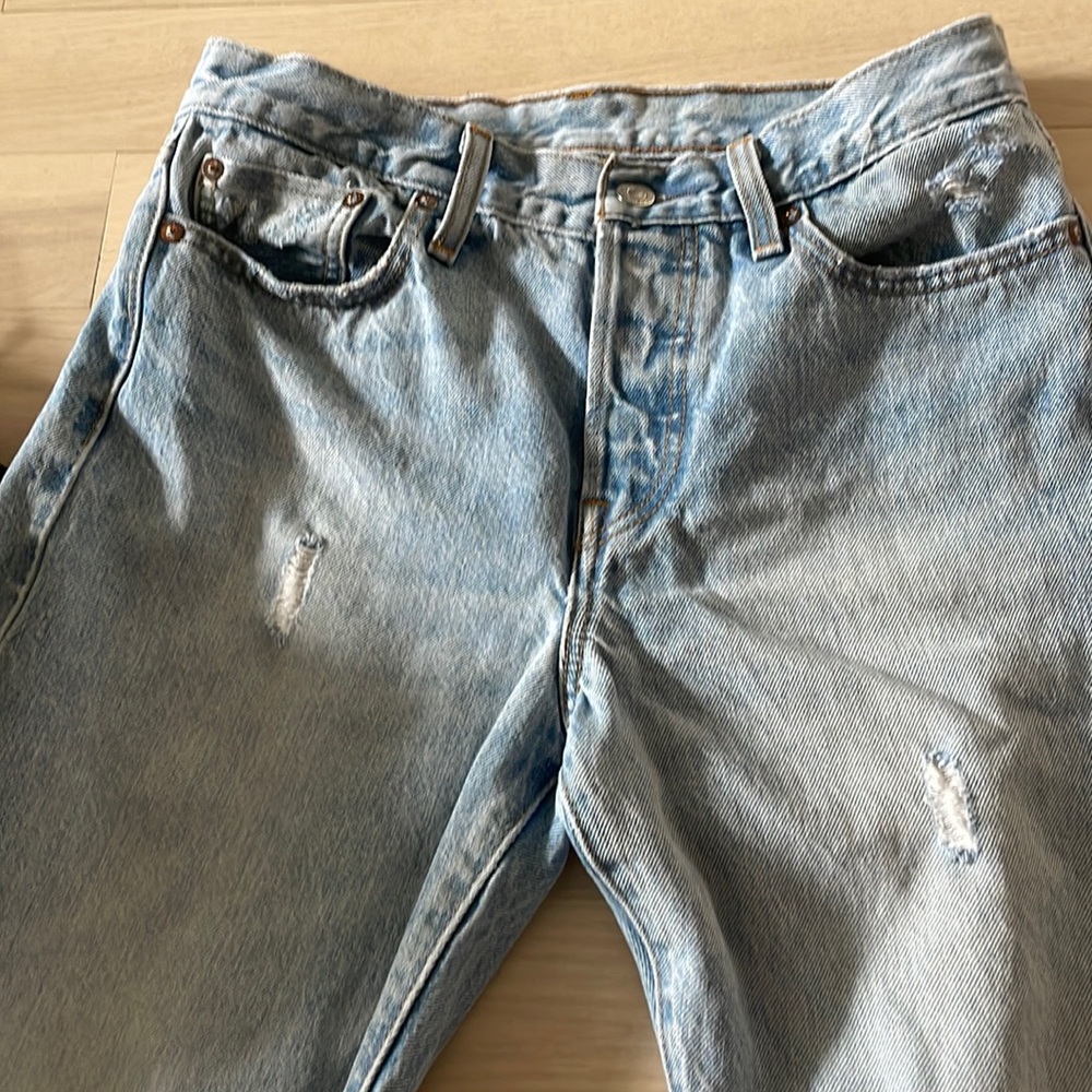 Levi’s distressed straight leg jeans